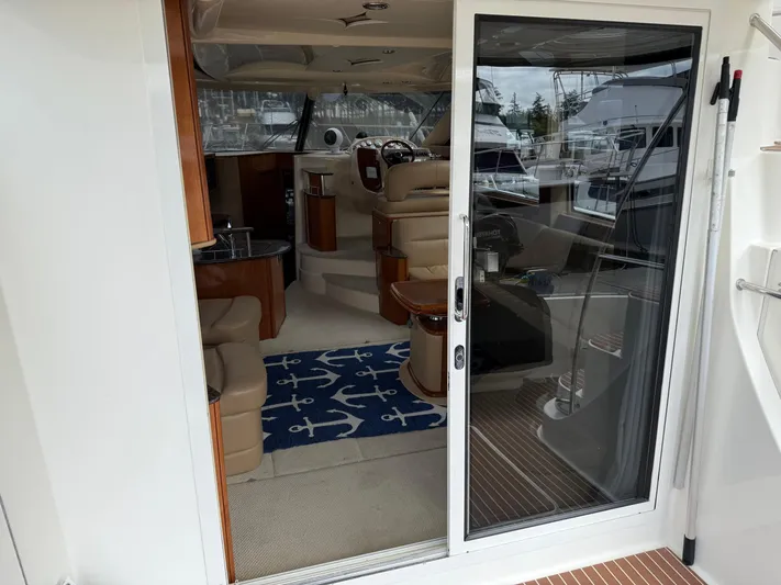  Yacht Photos Pics Interior view of a 2006 Meridian 391 Sedan yacht, featuring a cozy cabin and nautical decor.