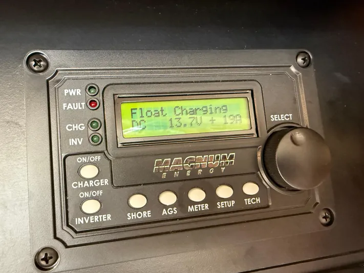  Yacht Photos Pics Magnum Energy charger display on 2006 Meridian 391 Sedan, showing float charging status.