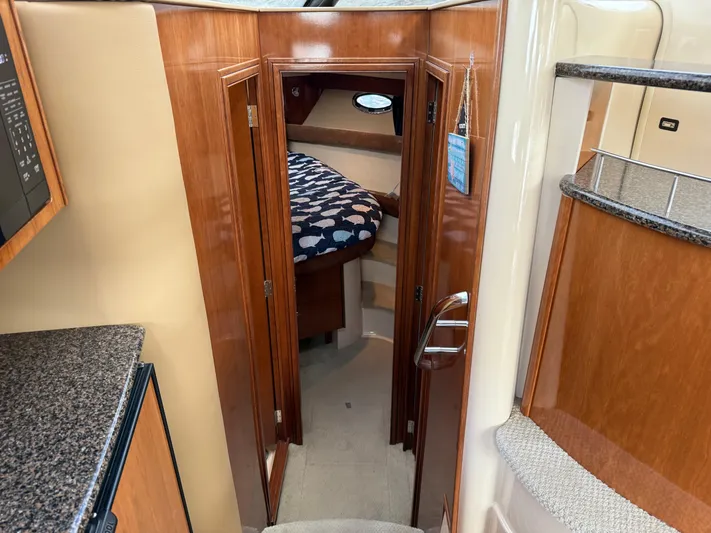  Yacht Photos Pics Interior of 2006 Meridian 391 Sedan yacht, featuring a cozy cabin entrance.