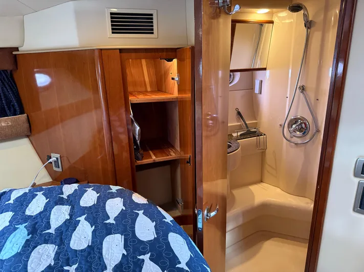  Yacht Photos Pics Interior of 2006 Meridian 391 Sedan with shower and wooden cabinetry.