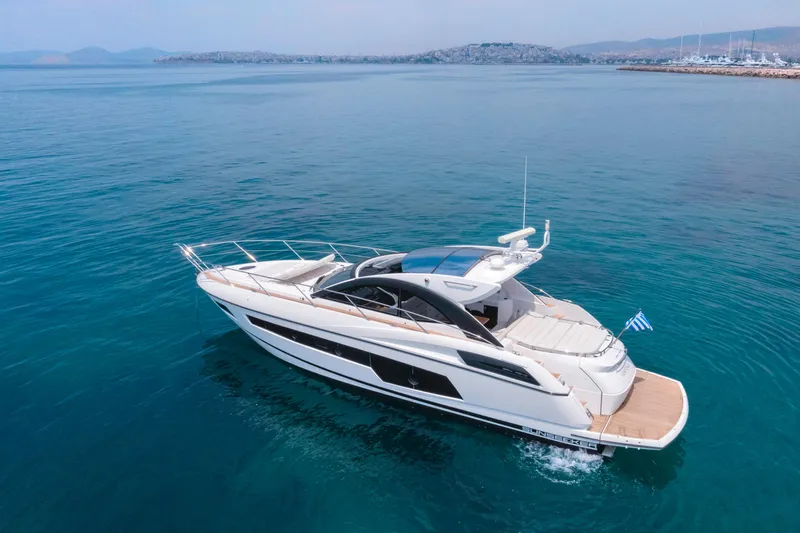  Yacht Photos Pics 2017 Sunseeker San Remo yacht cruising on clear blue waters.