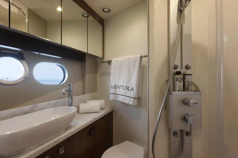 Yacht Photos Pics Luxurious bathroom in 2017 Sunseeker San Remo yacht with modern fixtures and elegant design.