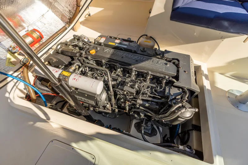 Blessed Yacht Photos Pics Engine compartment of a 2003 Hinckley Talaria 29 Runabout, showcasing detailed mechanical components.