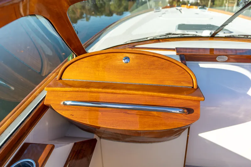 Blessed Yacht Photos Pics 2003 Hinckley Talaria 29 Runabout, elegant wooden dashboard detail, luxury boat interior.
