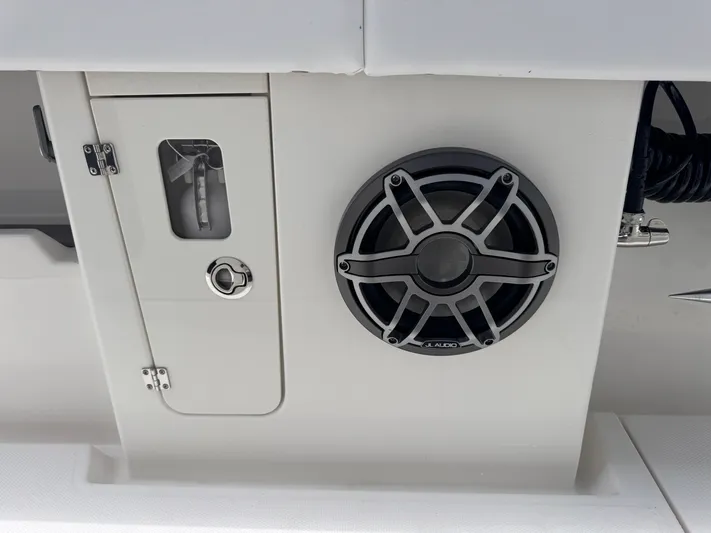 Call Today! 32 #55 Yacht Photos Pics Speaker and compartment on 2025 Solace 32 CS boat interior.