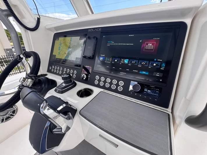 Call Today! 32 #55 Yacht Photos Pics Helm of 2025 Solace 32 CS boat with advanced navigation and control systems.