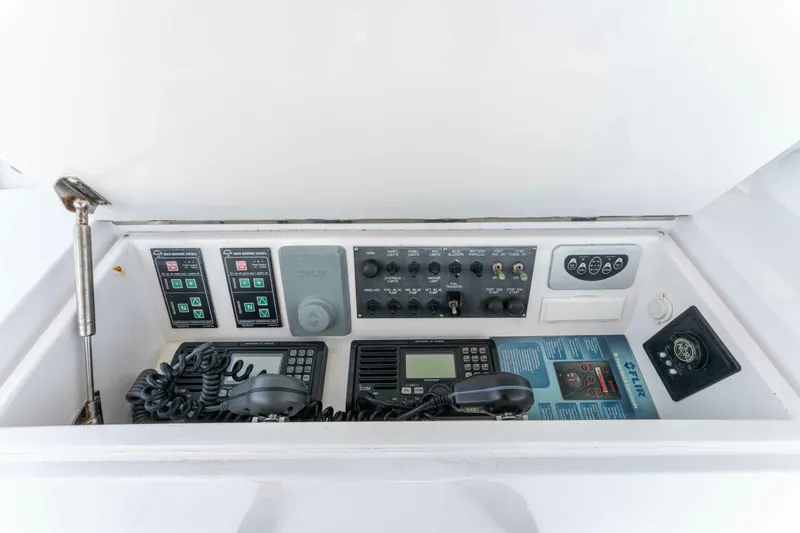 Wound Tight Yacht Photos Pics Control panel of a 2004 Viking 48 Convertible yacht with communication equipment.