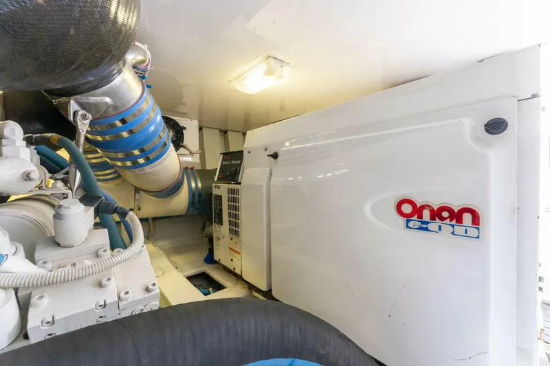 Wound Tight Yacht Photos Pics Engine room of 2004 Viking 48 Convertible with Onan generator.