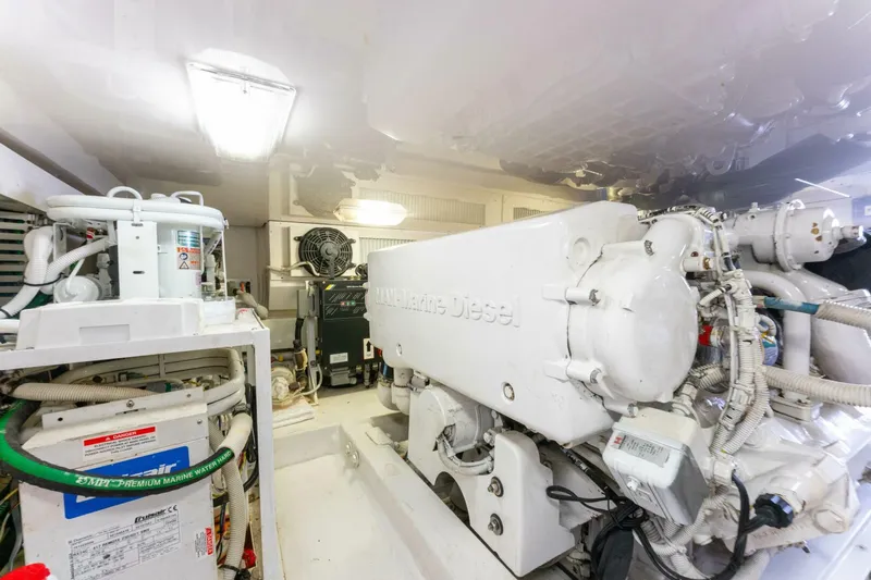 Wound Tight Yacht Photos Pics Engine room of 2004 Viking 48 Convertible yacht with marine diesel engine.