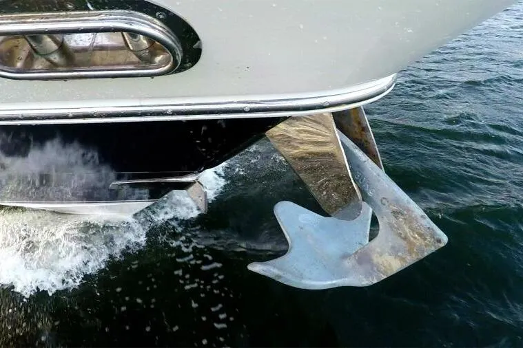 Jugni Yacht Photos Pics Anchor of 2003 Viking Princess 65 yacht submerged in water.