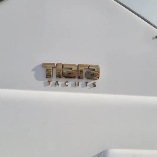 Blue Meridian Yacht Photos Pics Tiara Yachts logo on 2003 Tiara 3800 Open boat.