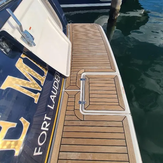 Blue Meridian Yacht Photos Pics Teak swim platform on 2003 Tiara Yachts 3800 Open, Fort Lauderdale.