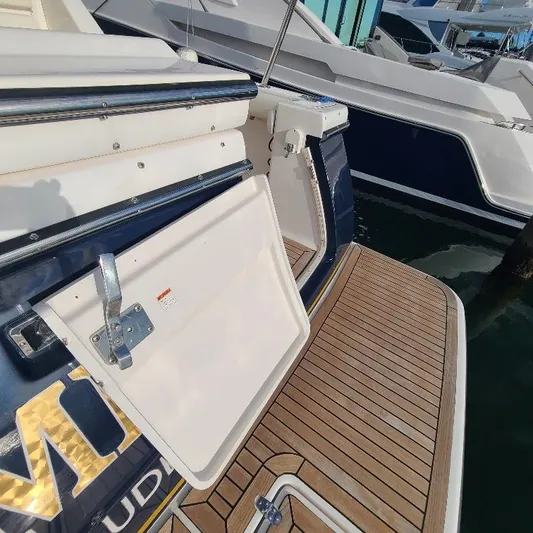 Blue Meridian Yacht Photos Pics 2003 Tiara Yachts 3800 Open with open hatch on teak deck.