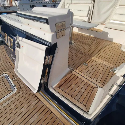 Blue Meridian Yacht Photos Pics 2003 Tiara Yachts 3800 Open with teak deck and open door.