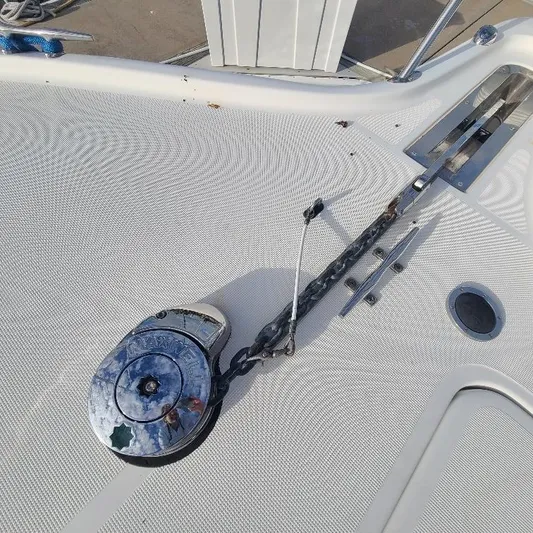 Blue Meridian Yacht Photos Pics Deck of 2003 Tiara Yachts 3800 Open with anchor chain and winch.