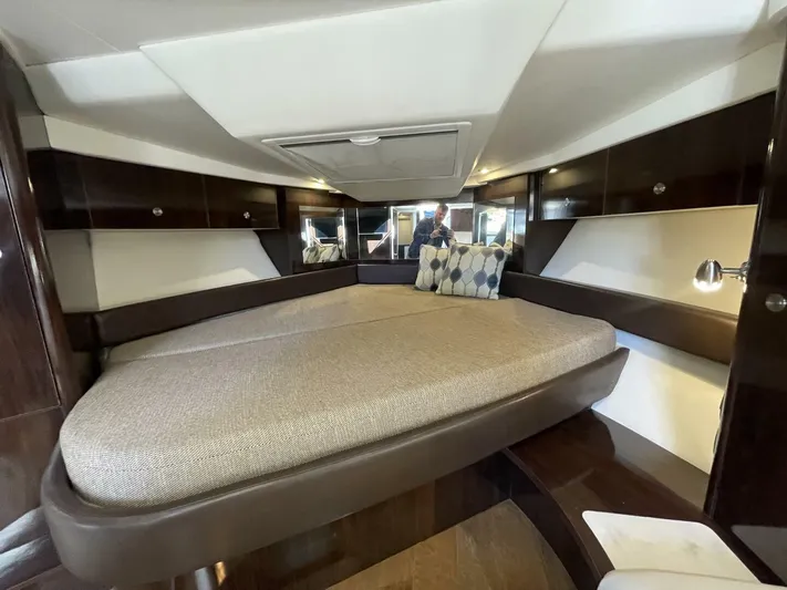 Tin Cup Chalice Yacht Photos Pics 2019 Sea Ray Sundancer 350 Coupe cabin with cozy bed and modern interior design.