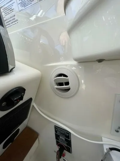 Tin Cup Chalice Yacht Photos Pics 2019 Sea Ray Sundancer 350 Coupe interior detail with air vent and control panel.