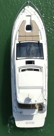 Tin Cup Chalice Yacht Photos Pics 2019 Sea Ray Sundancer 350 Coupe, aerial view, cruising on green water.