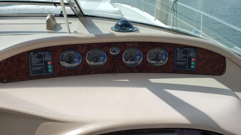 Pacific Dancer Yacht Photos Pics Dashboard of 2004 Sea Ray 550 Sundancer yacht with gauges and controls.