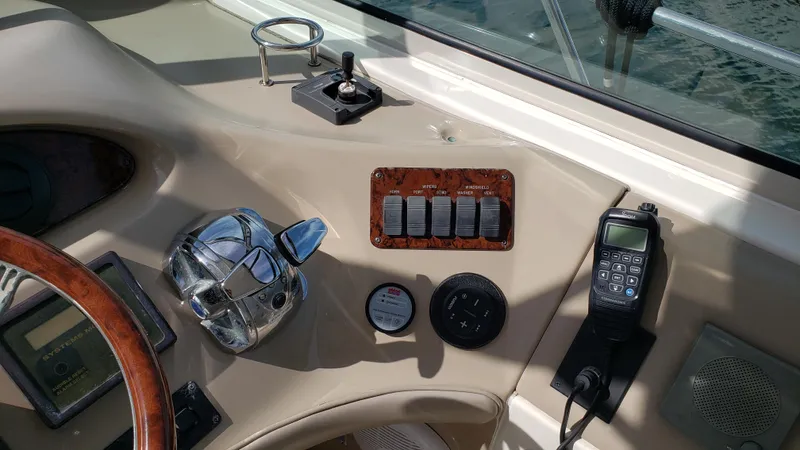 Pacific Dancer Yacht Photos Pics Control panel of a 2004 Sea Ray 550 Sundancer yacht with navigation instruments.