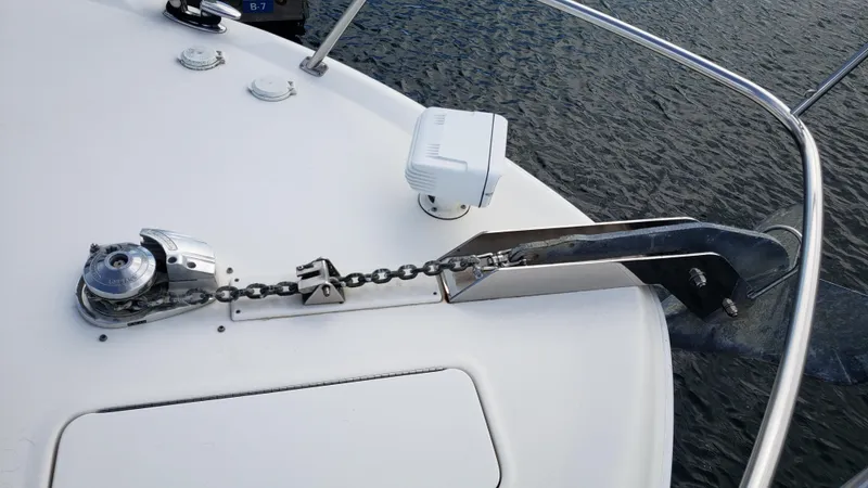 Pacific Dancer Yacht Photos Pics Bow of 2004 Sea Ray 550 Sundancer with anchor chain and winch system.