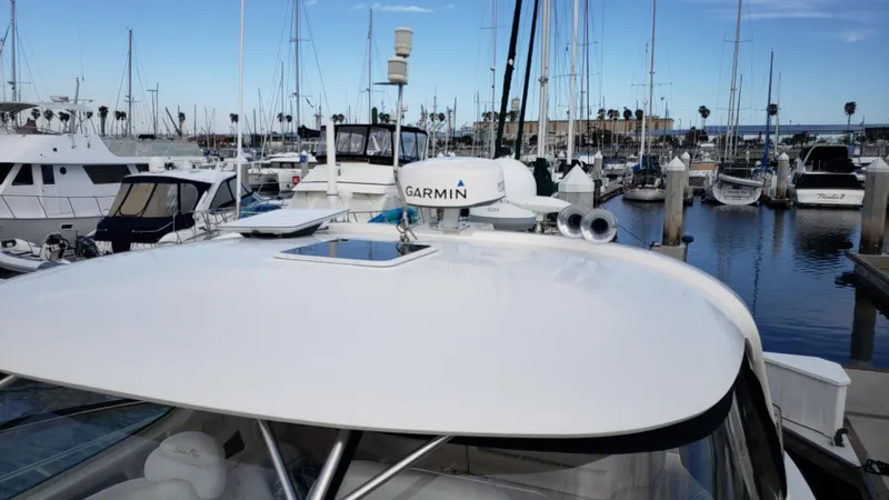 Pacific Dancer Yacht Photos Pics 2004 Sea Ray 550 Sundancer yacht docked in a marina with Garmin equipment.