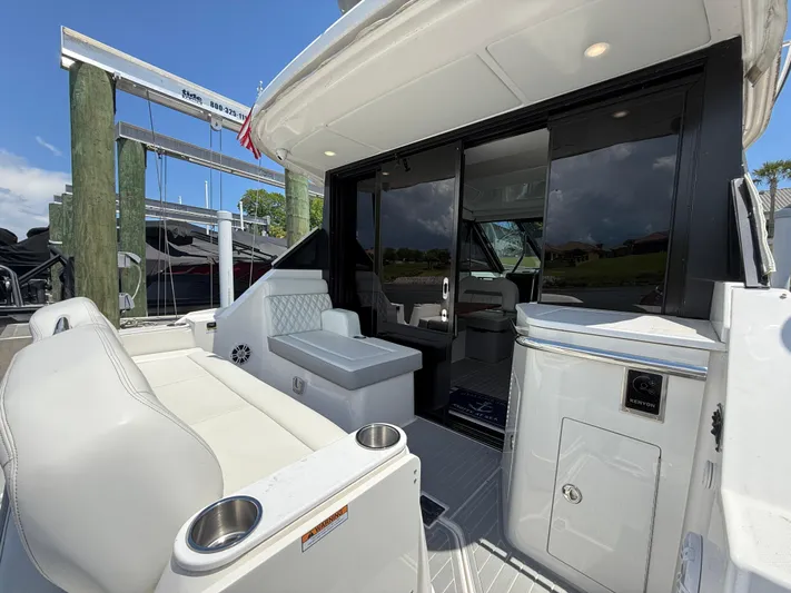  Yacht Photos Pics 2022 Regal 36 Grande Coupe yacht with sleek white interior and modern design.