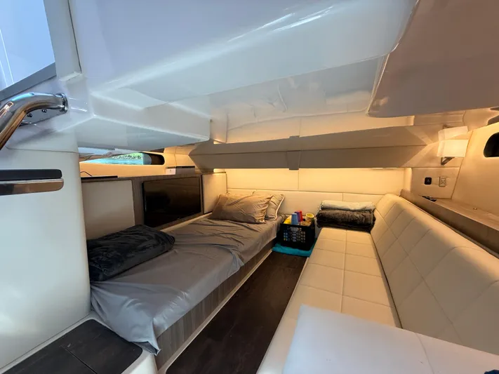  Yacht Photos Pics Luxurious interior of 2022 Regal 36 Grande Coupe yacht with cozy seating and modern design.