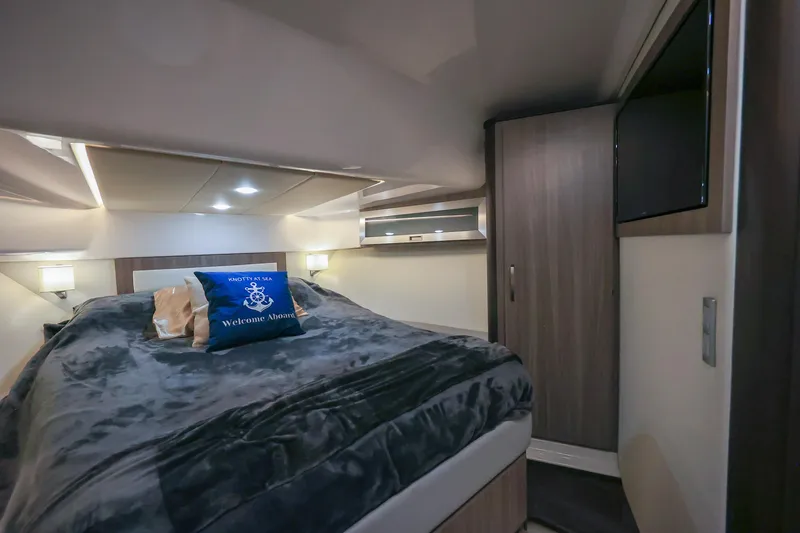  Yacht Photos Pics Luxurious cabin interior of 2022 Regal 36 Grande Coupe yacht.