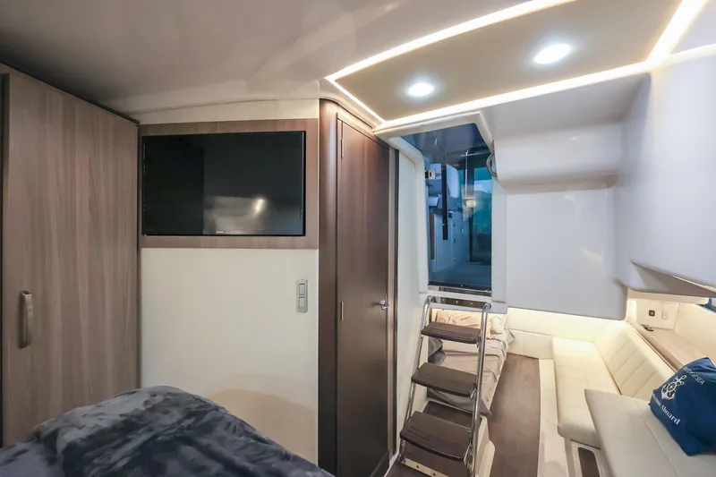  Yacht Photos Pics Luxurious interior of 2022 Regal 36 Grande Coupe yacht with modern amenities.