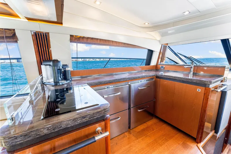 Kokomo Yacht Photos Pics Luxurious kitchen interior of 2016 Sea Ray 510 Fly yacht with ocean view.