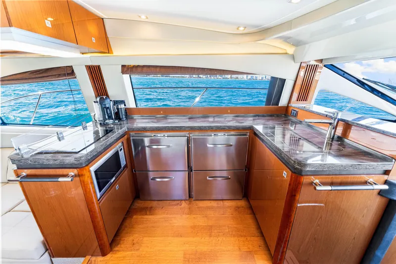 Kokomo Yacht Photos Pics Luxurious kitchen interior of 2016 Sea Ray 510 Fly yacht with modern appliances.