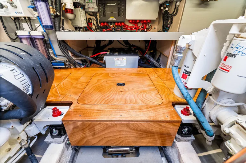 Kokomo Yacht Photos Pics Engine room of a 2016 Sea Ray 510 Fly yacht, showcasing mechanical components and wiring.