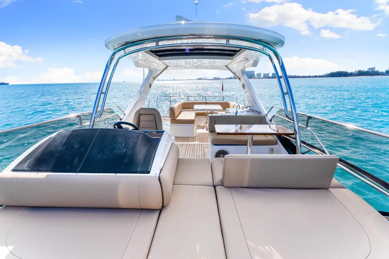 Kokomo Yacht Photos Pics 2016 Sea Ray 510 Fly yacht on open water, featuring luxurious deck and seating.