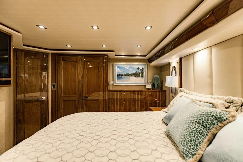 Sari Victoria Yacht Photos Pics Luxurious 2020 Viking 72 yacht bedroom with elegant wood finishes and modern lighting.