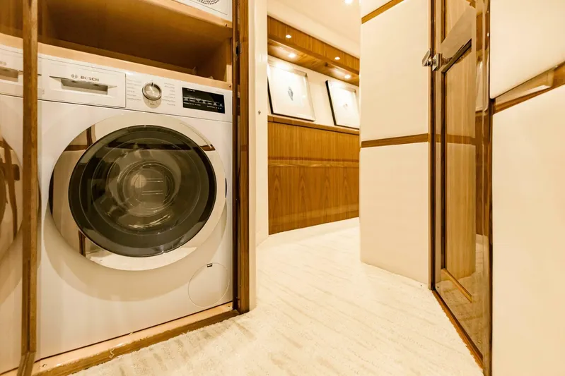 Sari Victoria Yacht Photos Pics Laundry area in 2020 Viking 72 yacht with Bosch washing machine.