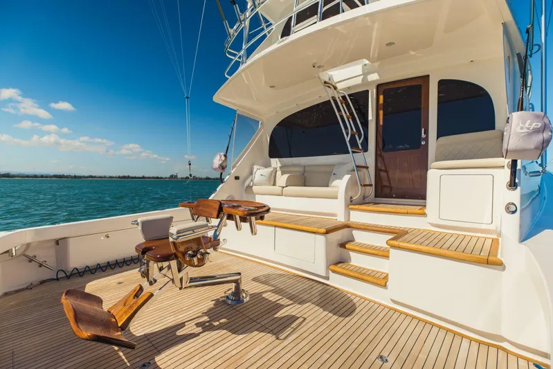 Sari Victoria Yacht Photos Pics Luxurious 2020 Viking 72 yacht deck with fishing chair and seating area.