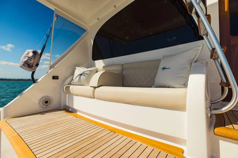 Sari Victoria Yacht Photos Pics Luxurious seating area on 2020 Viking 72 yacht with ocean view.