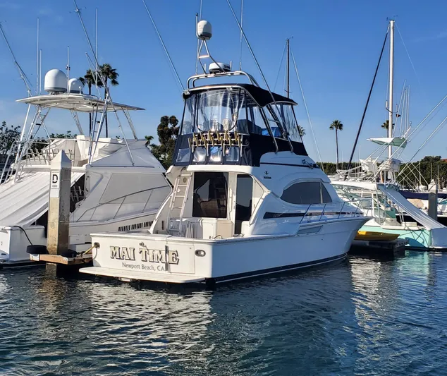 Mai Time Yacht Photos Pics 2001 Bertram 390 Convertible yacht docked in Newport Beach marina.