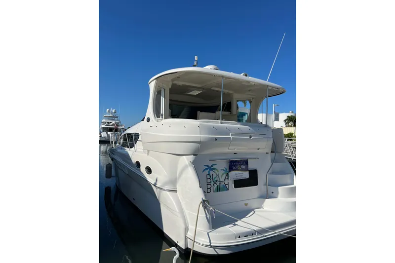 Bula Bula Yacht Photos Pics 2006 Sea Ray 40 Motor Yacht docked under clear blue sky.