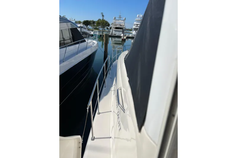 Bula Bula Yacht Photos Pics 2006 Sea Ray 40 Motor Yacht docked at marina, side view.