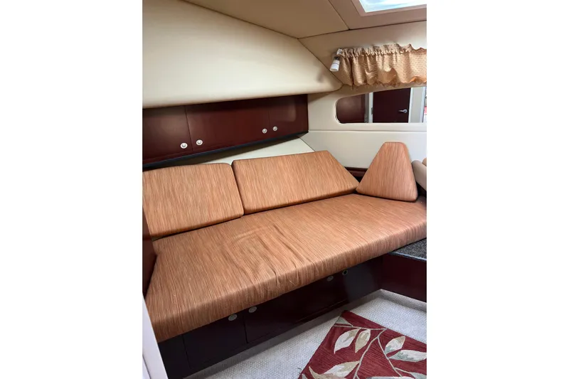 Bula Bula Yacht Photos Pics 2006 Sea Ray 40 Motor Yacht interior with beige seating and wooden cabinets.