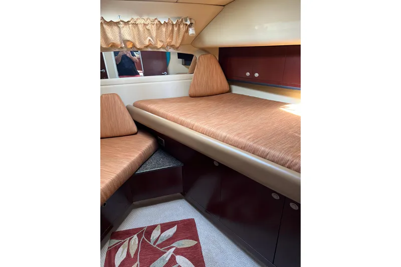 Bula Bula Yacht Photos Pics Interior cabin of 2006 Sea Ray 40 Motor Yacht with cozy seating and storage.