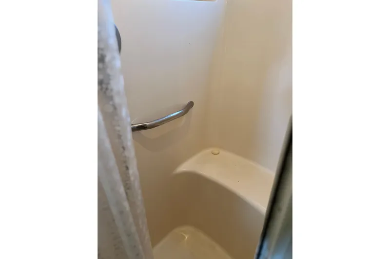 Bula Bula Yacht Photos Pics Shower area in 2006 Sea Ray 40 Motor Yacht with grab bar and seat.