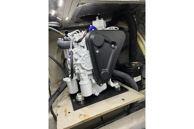 Bula Bula Yacht Photos Pics Engine compartment of a 2006 Sea Ray 40 Motor Yacht, showcasing mechanical components.