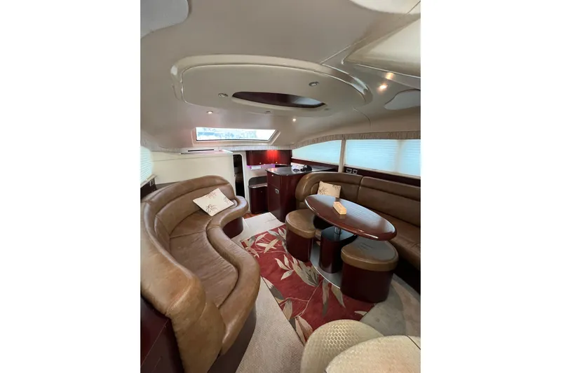 Bula Bula Yacht Photos Pics Luxurious interior of 2006 Sea Ray 40 Motor Yacht with elegant seating and modern design.
