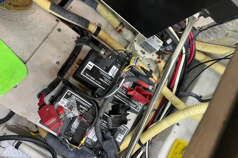 Bula Bula Yacht Photos Pics Engine room of 2006 Sea Ray 40 Motor Yacht with batteries and wiring.