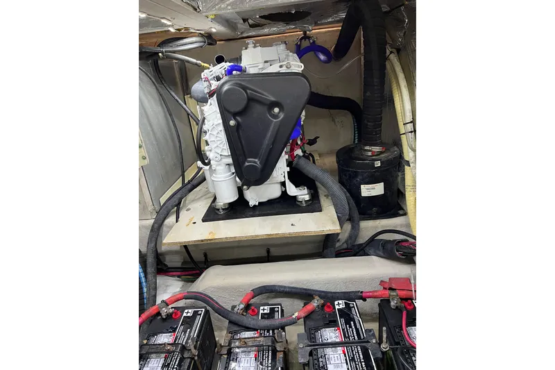 Bula Bula Yacht Photos Pics Engine room of 2006 Sea Ray 40 Motor Yacht with visible components and batteries.