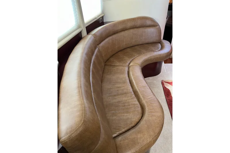 Bula Bula Yacht Photos Pics Curved leather seating in 2006 Sea Ray 40 Motor Yacht interior.
