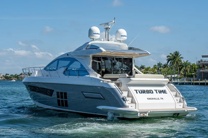  Yacht Photos Pics 2014 Azimut 55S yacht cruising on water, featuring sleek design and modern amenities.